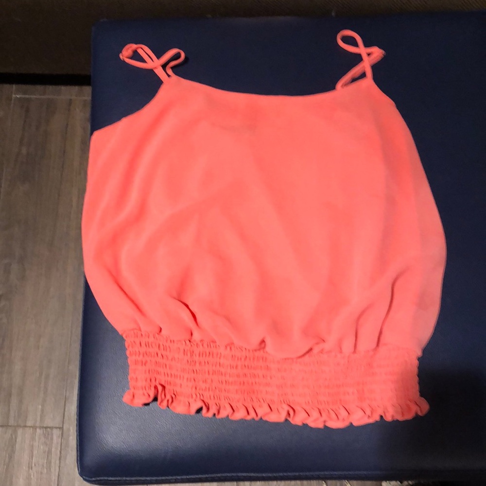 Orange body suit and tank